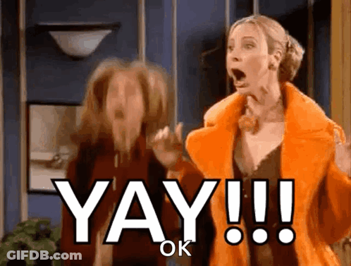 Two Women Are Standing Next To Each Other And One Of Them Says Yay Ok GIF