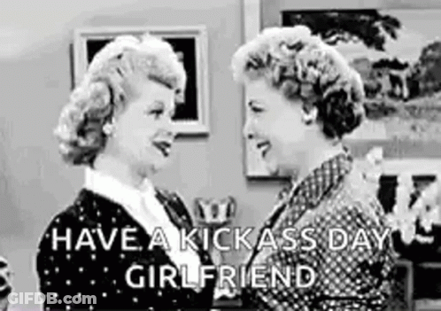 Two Women Are Standing Next To Each Other In A Living Room And Talking . GIF