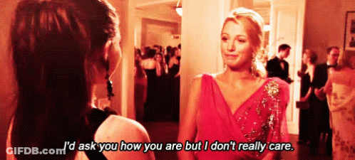 Two Women Are Standing Next To Each Other In A Room And One Of Them Is Talking To The Other . GIF