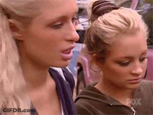 Two Women Are Standing Next To Each Other With Fox Written On The Bottom Right GIF