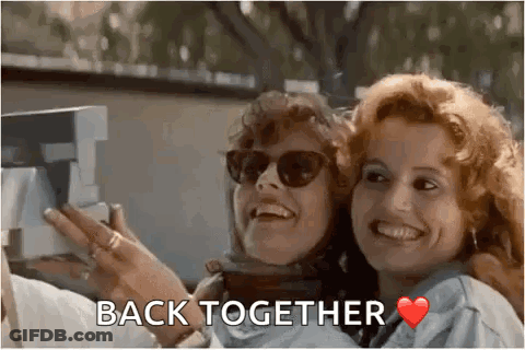 Two Women Are Taking A Selfie Together With The Words `` Back Together '' Written On The Bottom . GIF