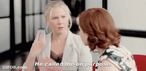 Two Women Are Talking To Each Other And One Of Them Says `` He Called Me On Purpose . '' GIF