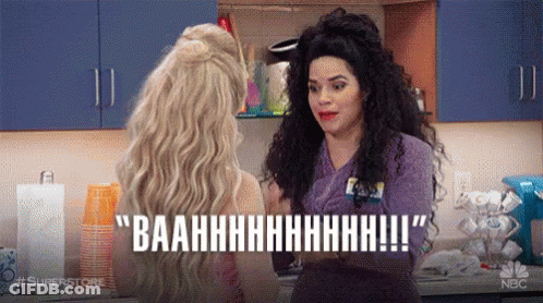 Women Talking In Kitchen One In Nurse Uniform GIF