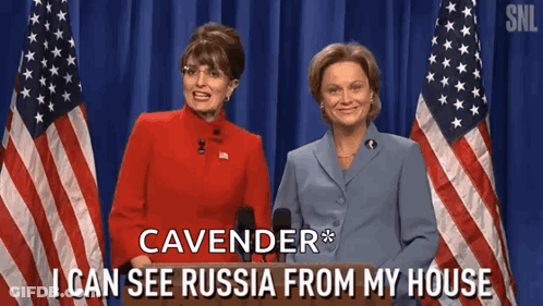 Two Women At Podium Saying Cavender I Can See Russia From My House GIF
