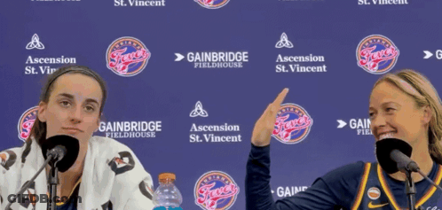 Two Women At Purple Gainbridge Fieldhouse Backdrop GIF
