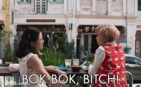Two Women At Table Saying Bok-Bok Bitch GIF
