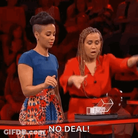 Two Women At Table With No Deal Sign GIF