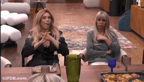 Two Women At Table With Tray, Green Glass GIF
