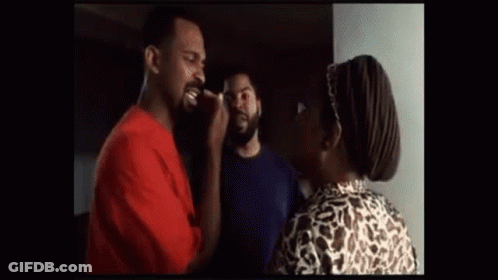 Two Women Beside Car In Parking Lot GIF