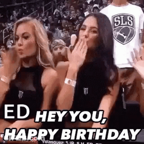 Two Women Blowing Kisses At Basketball Game GIF