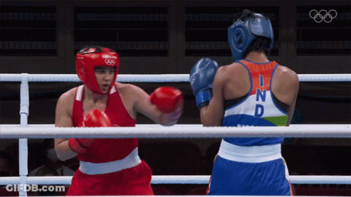 Two Women Boxing In Ring With Ind Tank Top GIF