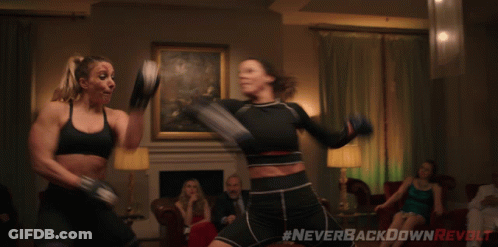 Two Women Boxing With Hashtag Neverbackdownrevolt GIF