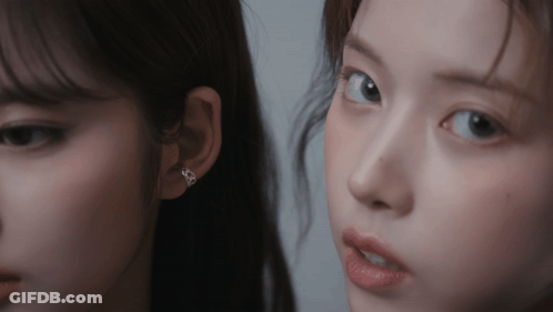 Two Women Close Up One Wearing Diamond Earring GIF