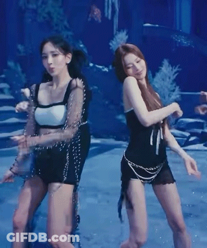 Two Women Dancing In Blue Pool GIF