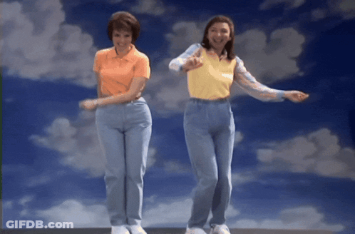Two Women Dancing In Front Of Cloudy Sky GIF