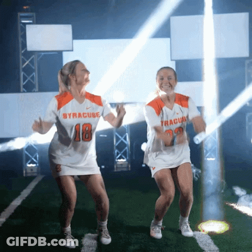 Two Women Dancing In Syracuse Jerseys GIF