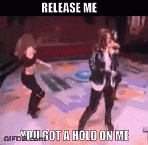 Two Women Dancing On Stage Saying Release Me You Got A Hold On Me GIF