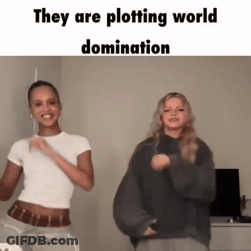 Two Women Dancing Plotting World Domination GIF