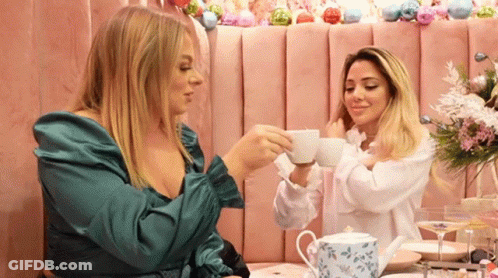Two Women Drinking Tea GIF