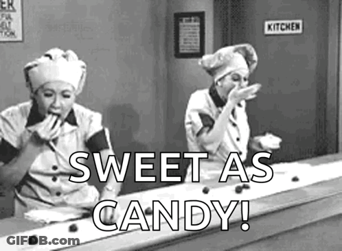 Two Women Eating Candy GIF