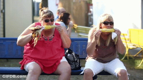 Two Women Eating Corn On The Cob GIF