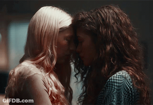 Two Women Eyes Closed Facing Each Other GIF