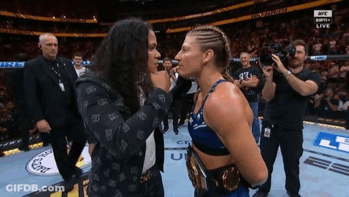 Two Women Facing Each Other In UFC Ring GIF