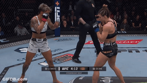 Two Women Fighting In UFC Ring Clock 4:12 GIF