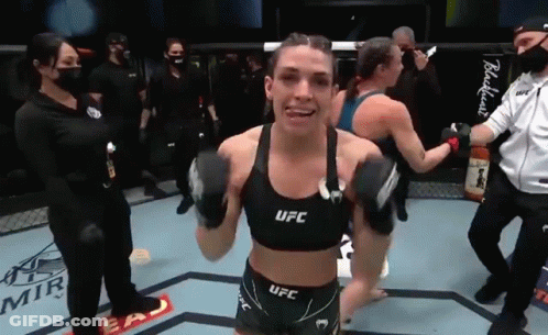 Two Women Fighting In UFC Ring Clock 4:12 GIF