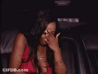 Two Women High-Fiving In Car GIF