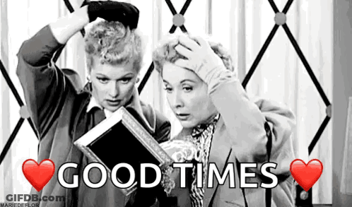 Two Women Holding Book Good Times GIF