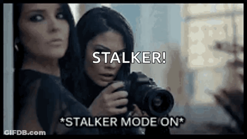 Two Women Holding Camera Stalker GIF