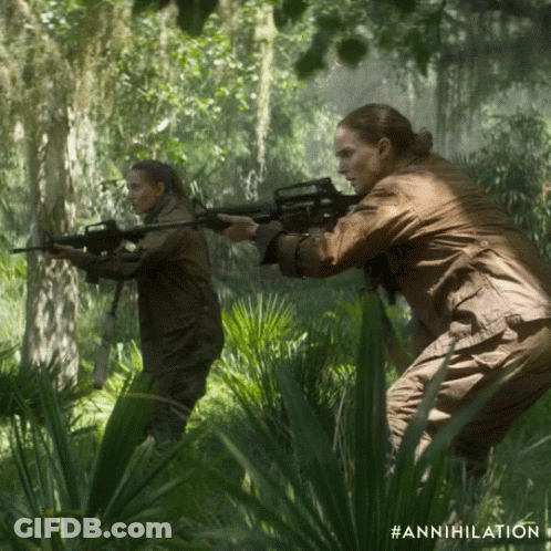 Two Women Holding Guns In Forest #Annihilation GIF