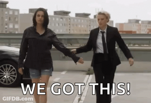 Two Women Holding Hands In A Parking Lot With The Words We Got This On The Bottom GIF