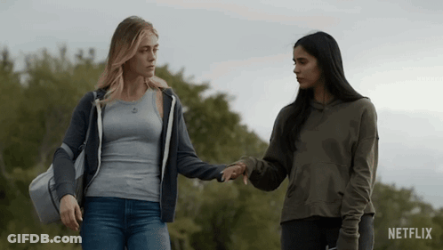 Two Women Holding Hands Netflix Logo GIF