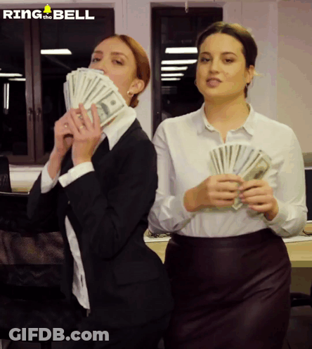 Two Women Holding Stacks Of Money With Ring The Bell Written On The Bottom GIF
