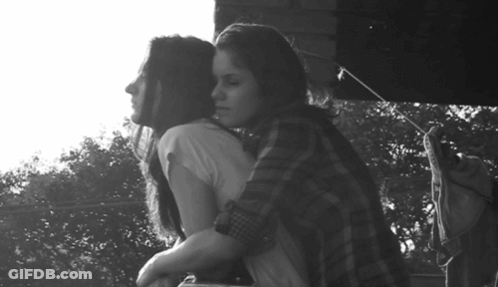 Two Women Hugging Black And White Photo GIF