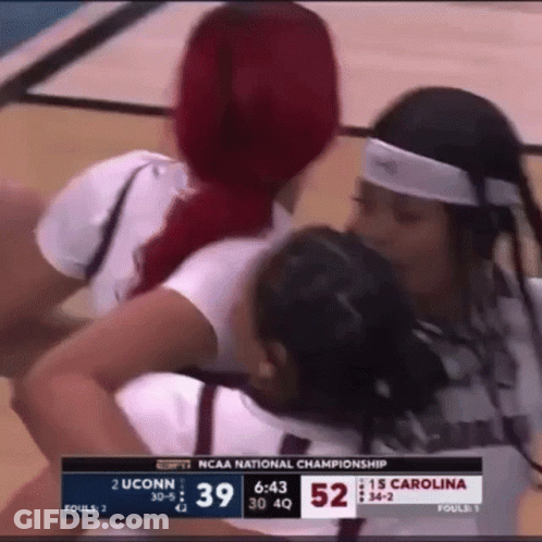 Two Women Hugging On Basketball Court GIF