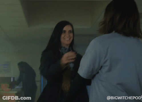 Two Women Hugging One With Jade Name Tag GIF