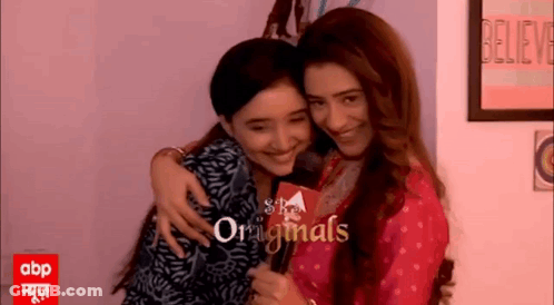 Two Women Hugging GIF
