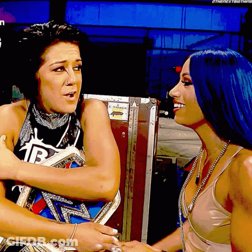 Two Women Hugging With C-Train Sticker GIF