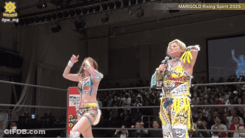 Two Women In A Wrestling Ring With Marigold Rising Spirit 2025 Written On The Bottom GIF