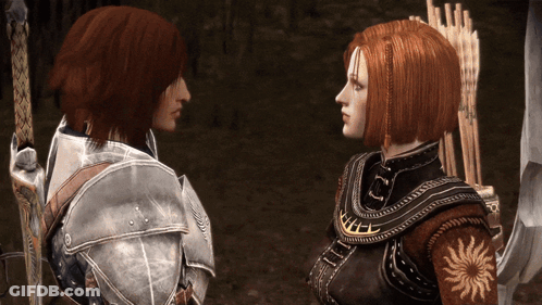 Two Women In Armor Are Looking At Each Other And One Has A Sun On Her Chest GIF