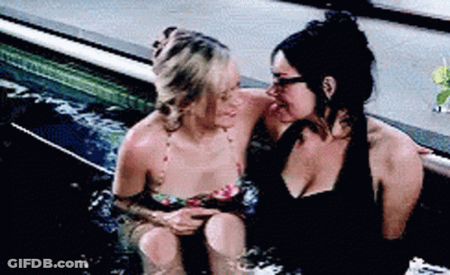 Two Women In Bikinis Kissing In Bathtub GIF