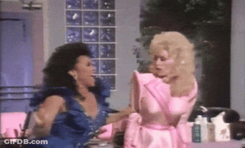 Two Women In Blue And Pink Dresses GIF