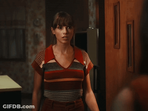 Two Women In Blue Tiled Bathroom GIF