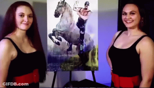 Two Women In Front Of Horse Riding Painting GIF