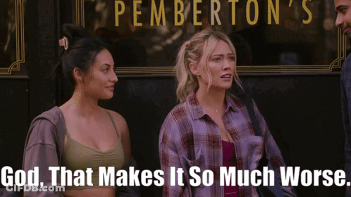 Two Women In Front Of Pemberton's Restaurant GIF