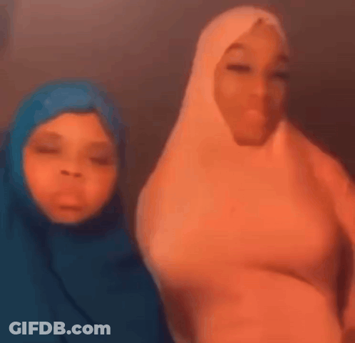 Two Women In Hijabs Smiling GIF