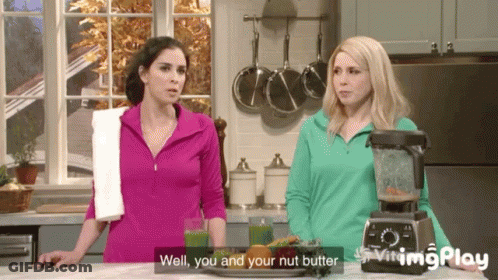 Two Women In Kitchen Saying Well You And Your Nut Butter GIF